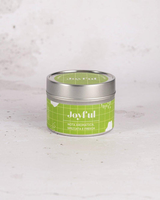 Candela Joyful di Hyggekrog - profumi mediterranei - zenzero e lemongrass - profumazione fresca 
